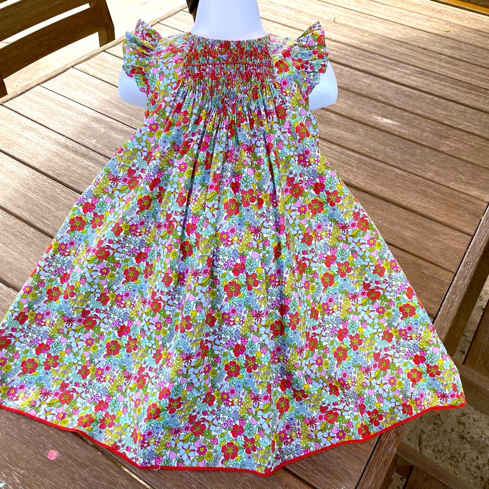 New FLEURISSE beautiful dress with tag attached for $145 . 4 years